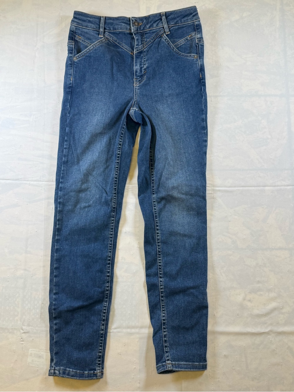 We The Free Indigo Skinny Jeans with Geometric Stitching Pattern